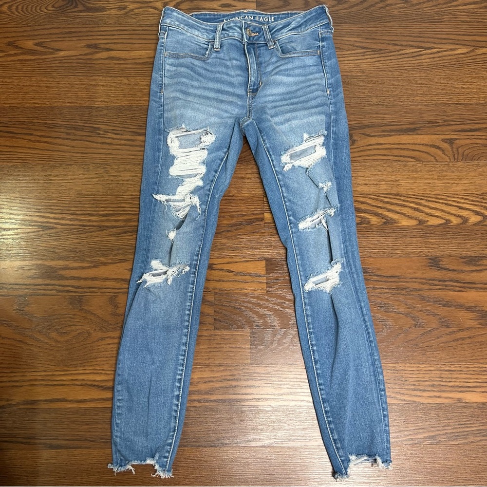 American Eagle Distressed Next Level Stretch Jegging in Light Wash size 6 short